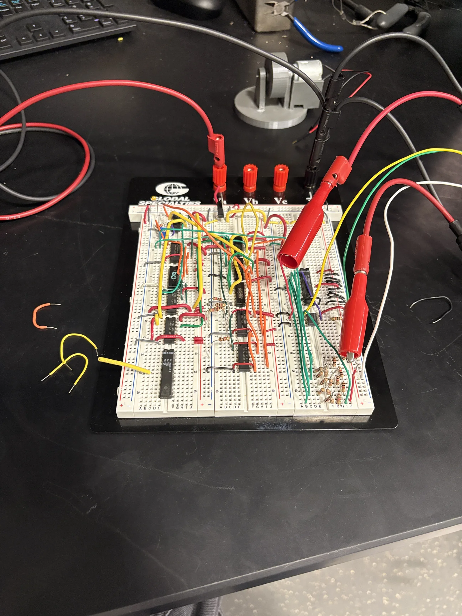 PWM servo control unit built on a breadboard with timing logic and wiring