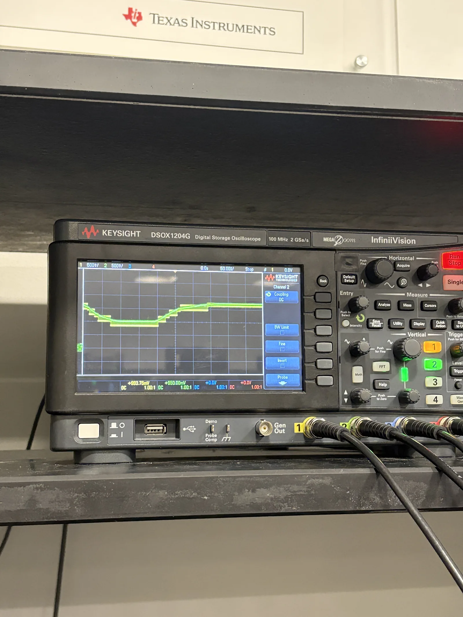 Tracking ADC oscilloscope capture showing a stepped output following the input signal
